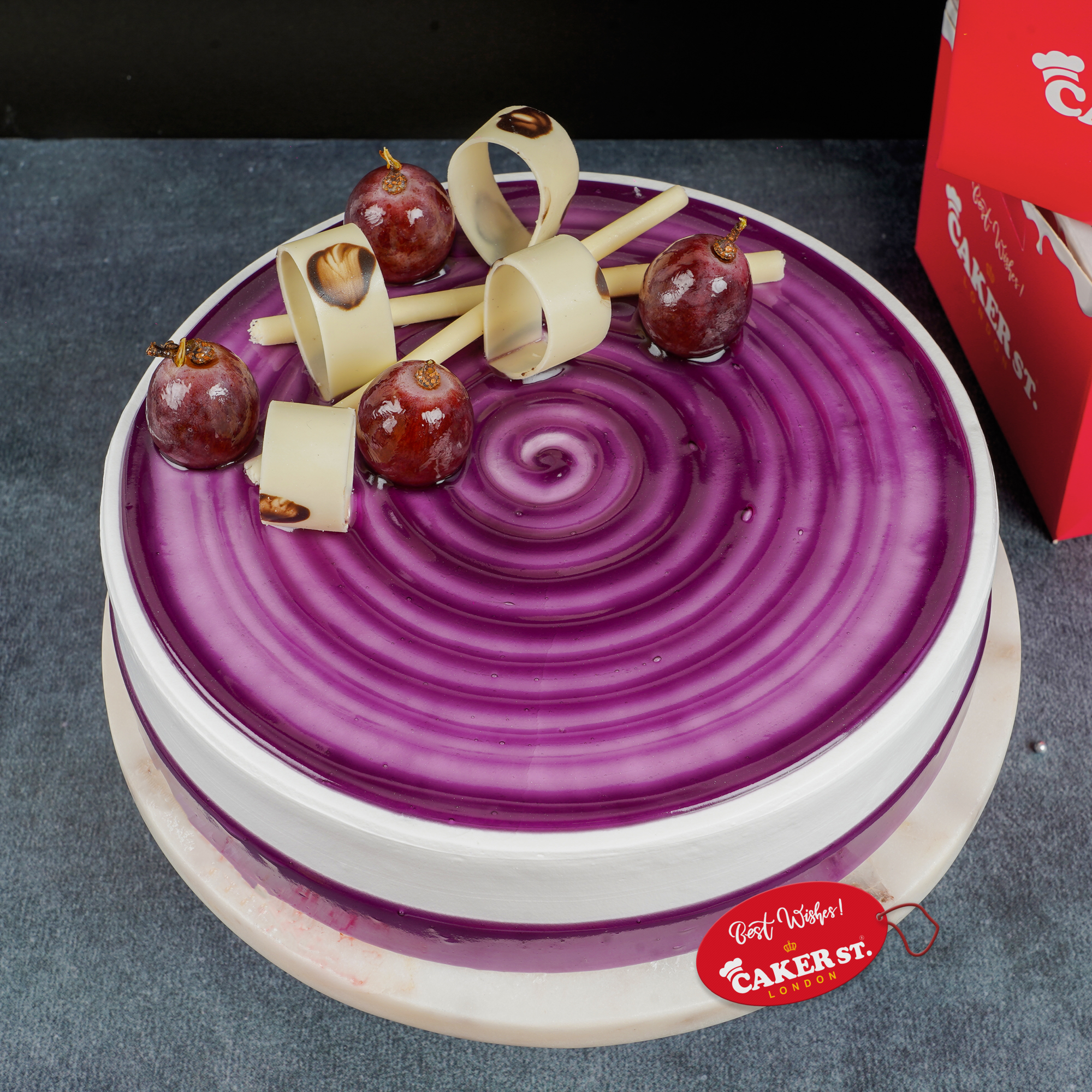 Elegant Grape Swirl Birthday Cake