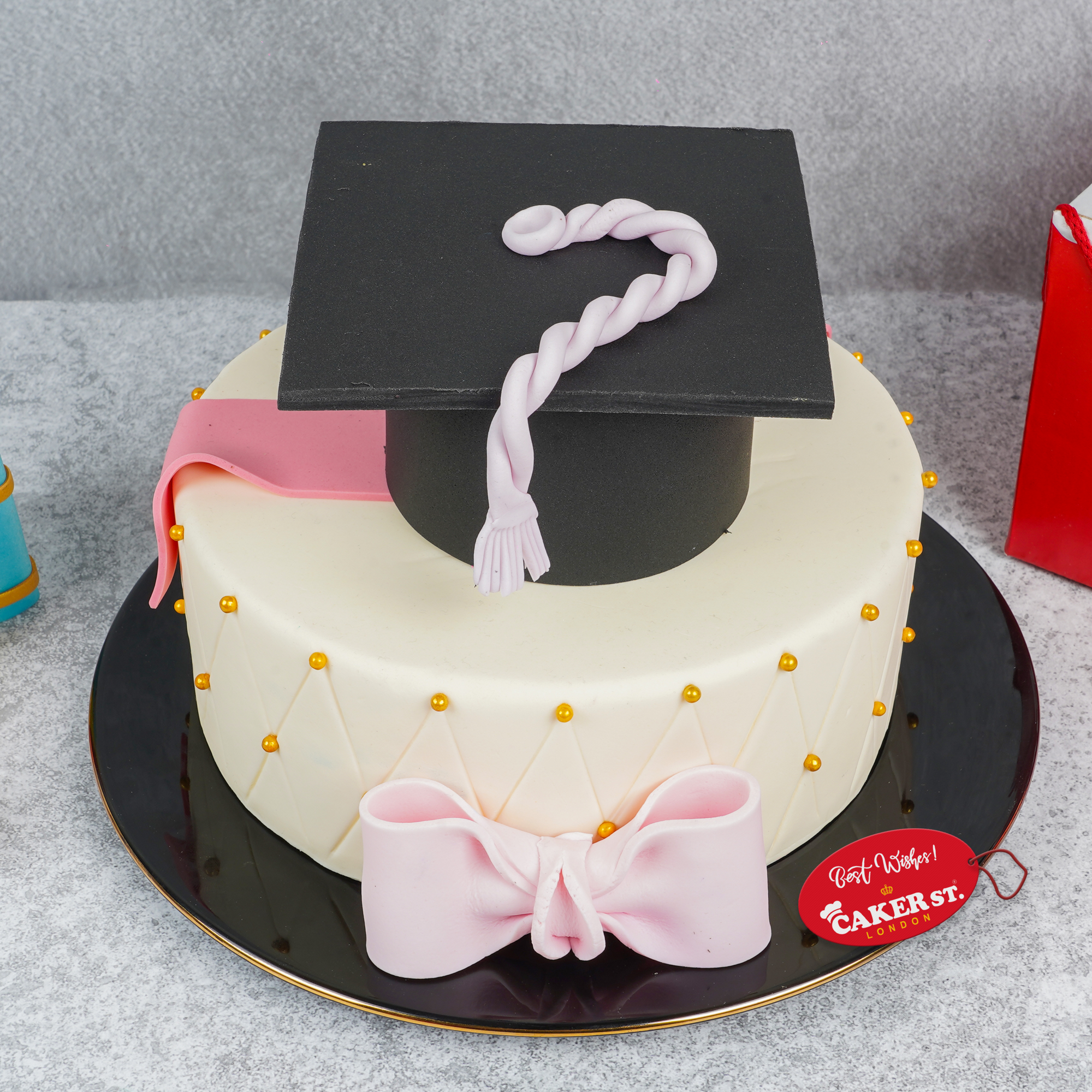 Elegant Graduation Cake with Cap & Bow