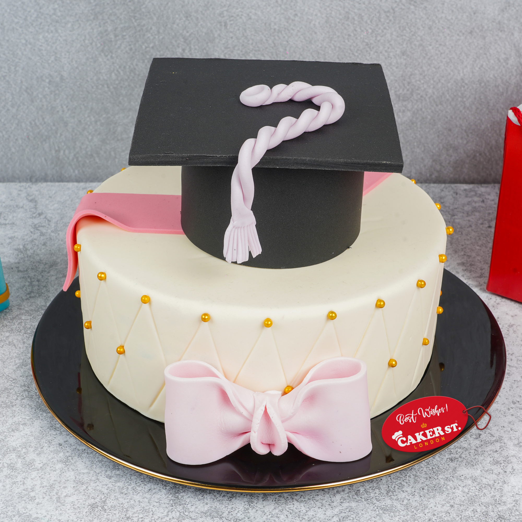 Elegant Graduation Cake with Cap & Bow