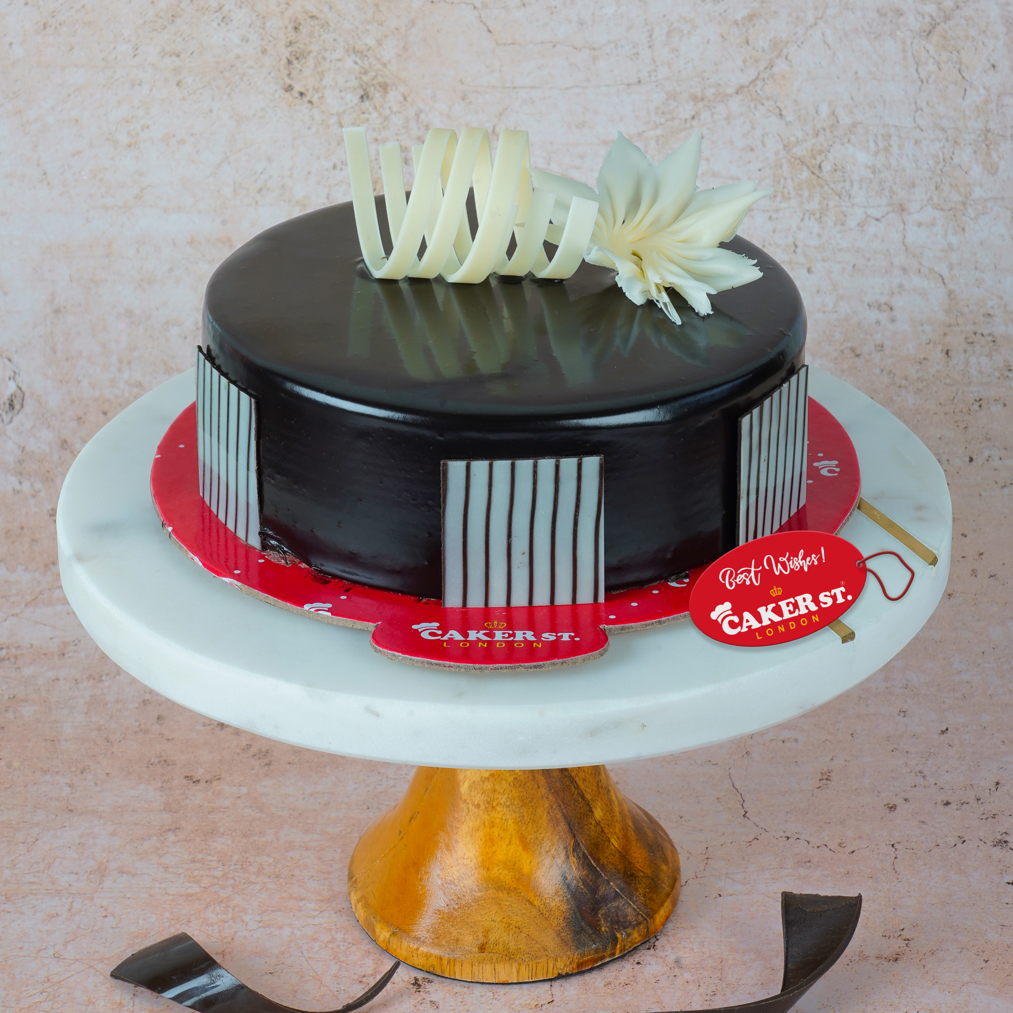 Elegant Birthday Cake with Floral & Stripe Detail
