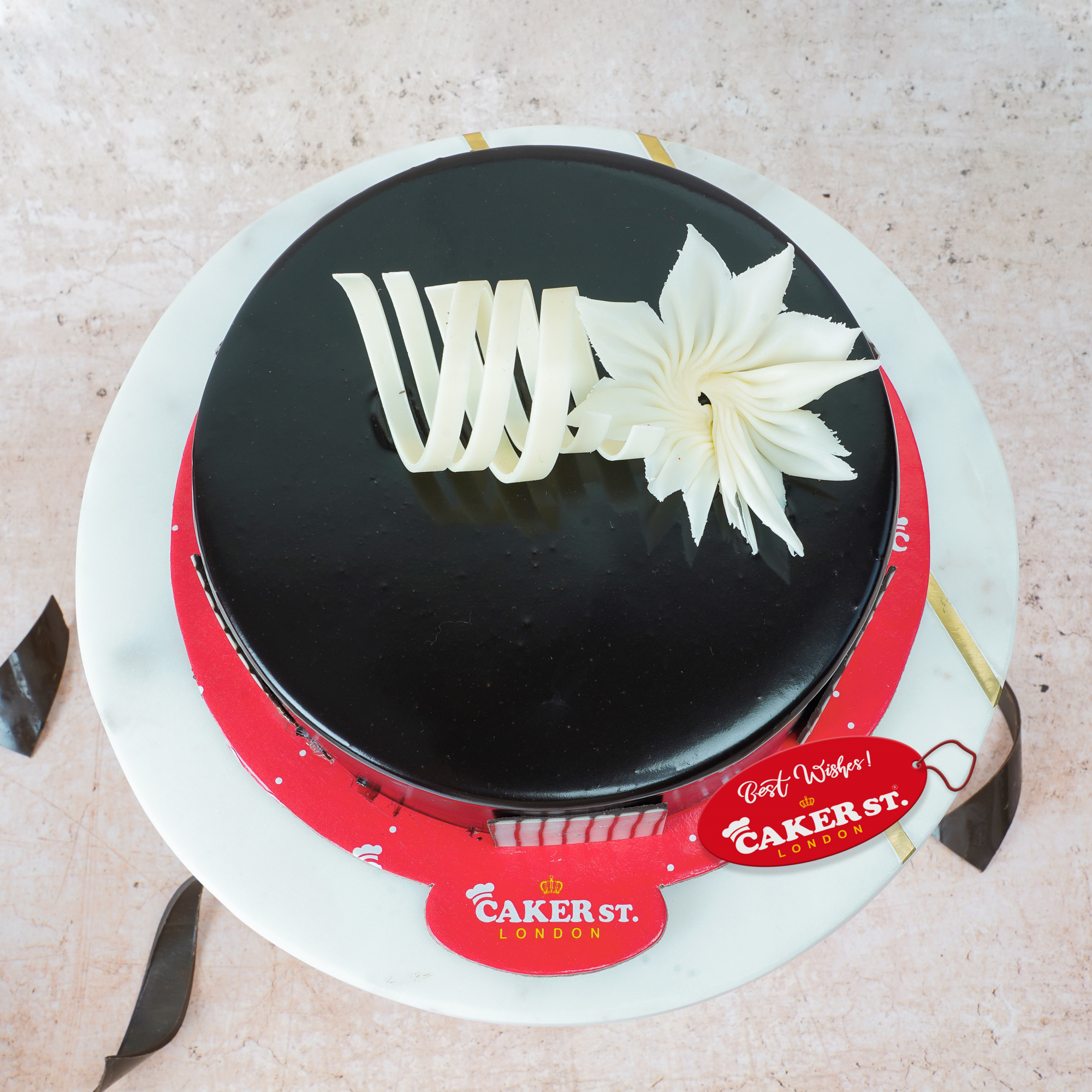 Elegant Birthday Cake with Floral & Stripe Detail
