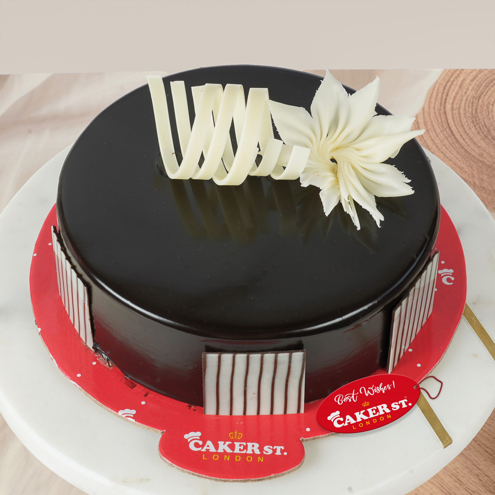 Elegant Birthday Cake with Floral & Stripe Detail