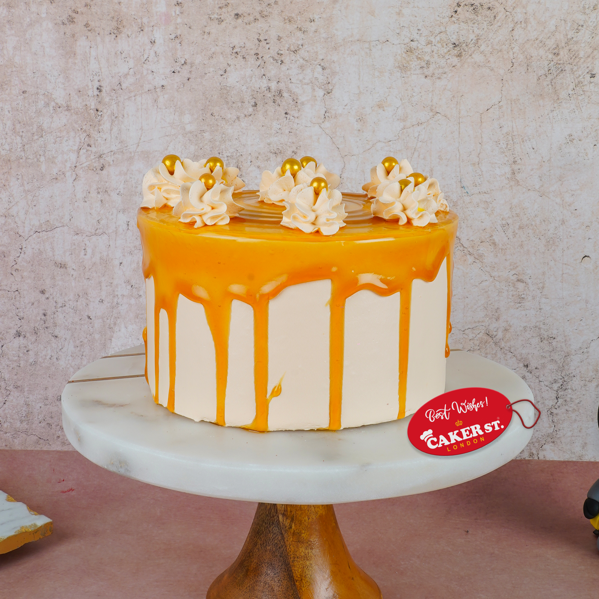 Elegant Drip Birthday Cake with Rosettes