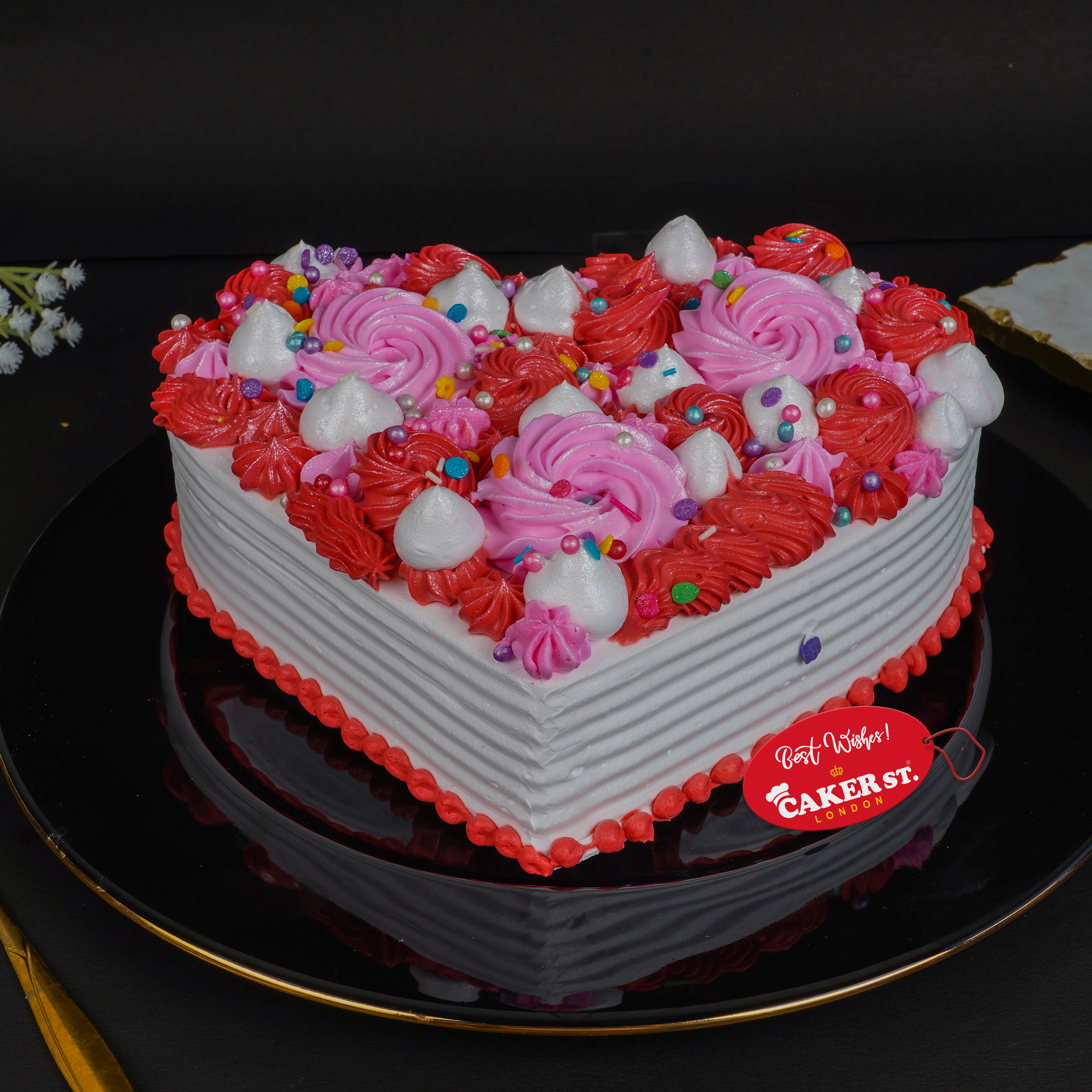 Heart Shaped Birthday Cake with Pink & Red Swirls