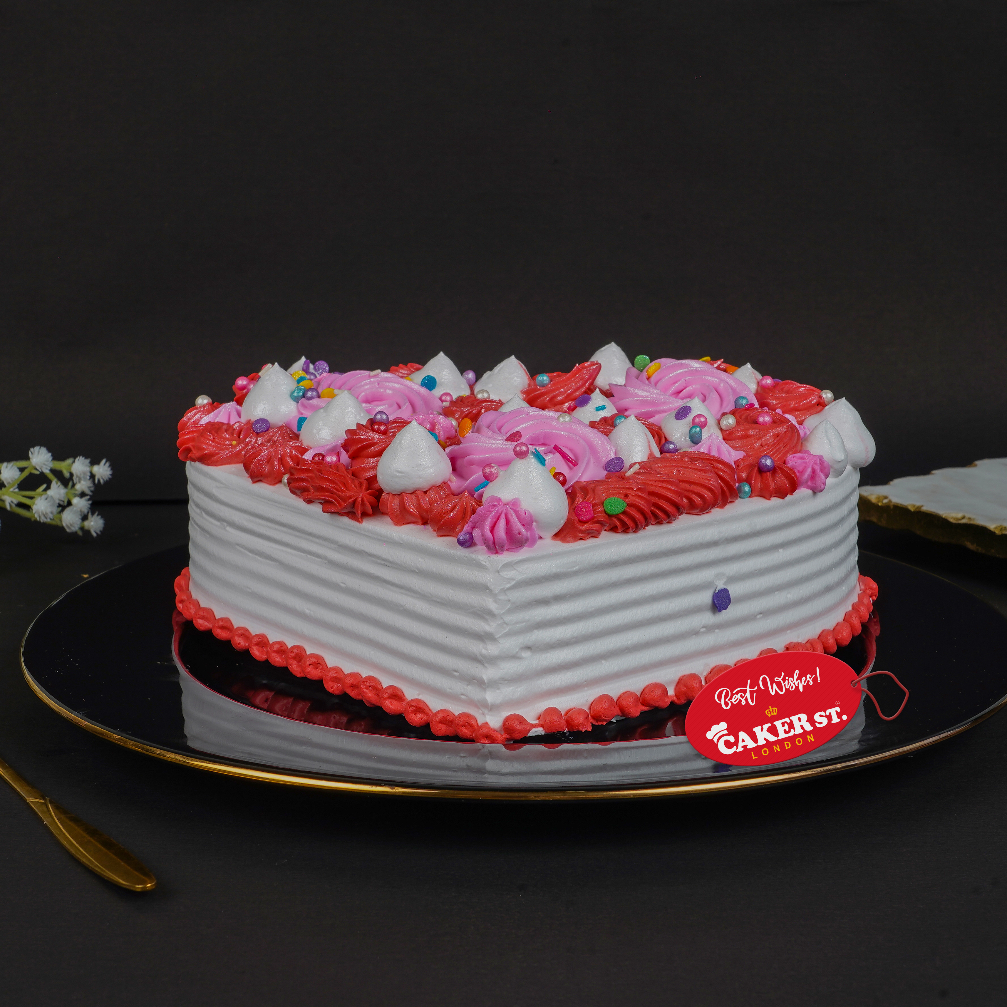 Heart Shaped Birthday Cake with Pink & Red Swirls