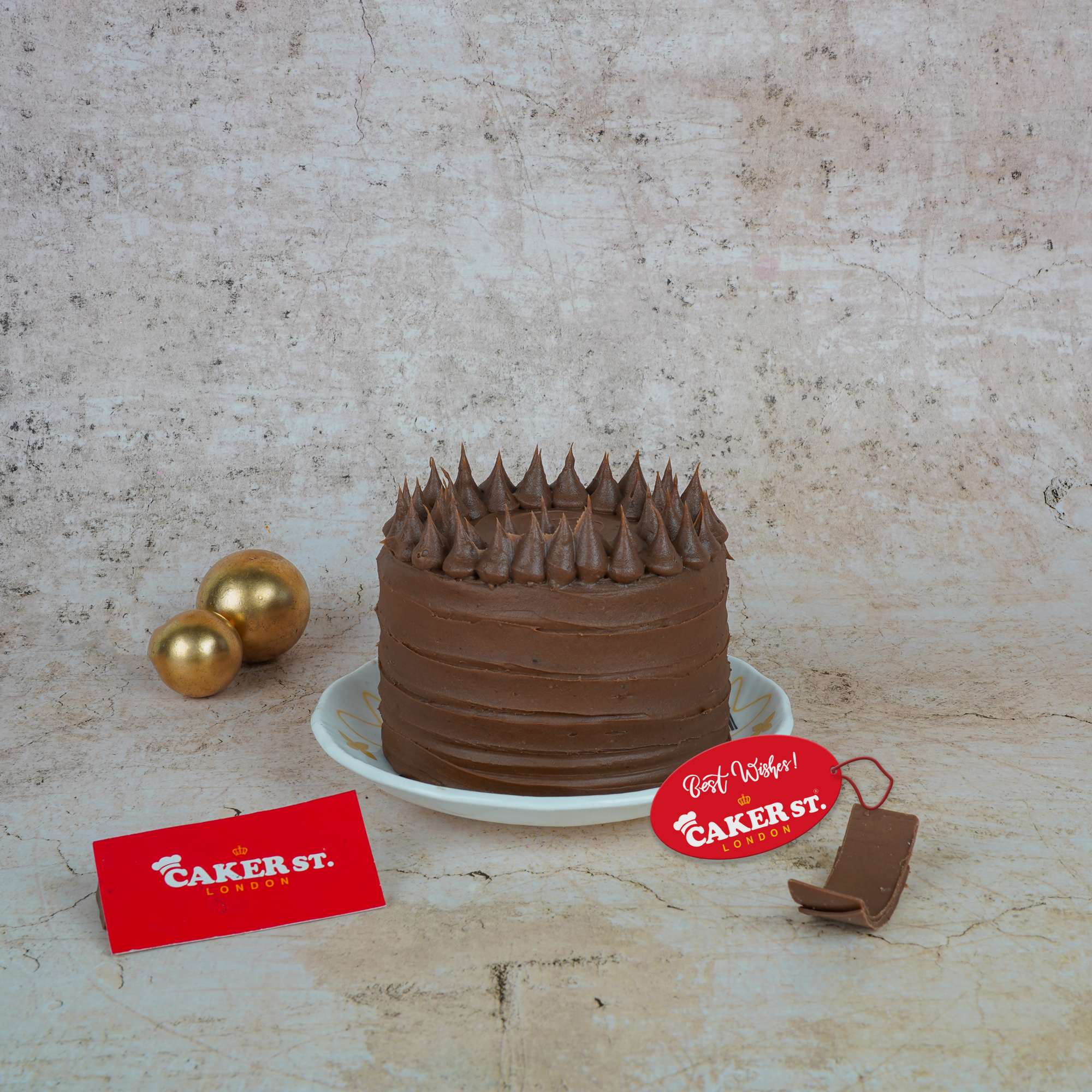 Elegant Chocolate Birthday Cake with Gold Accents