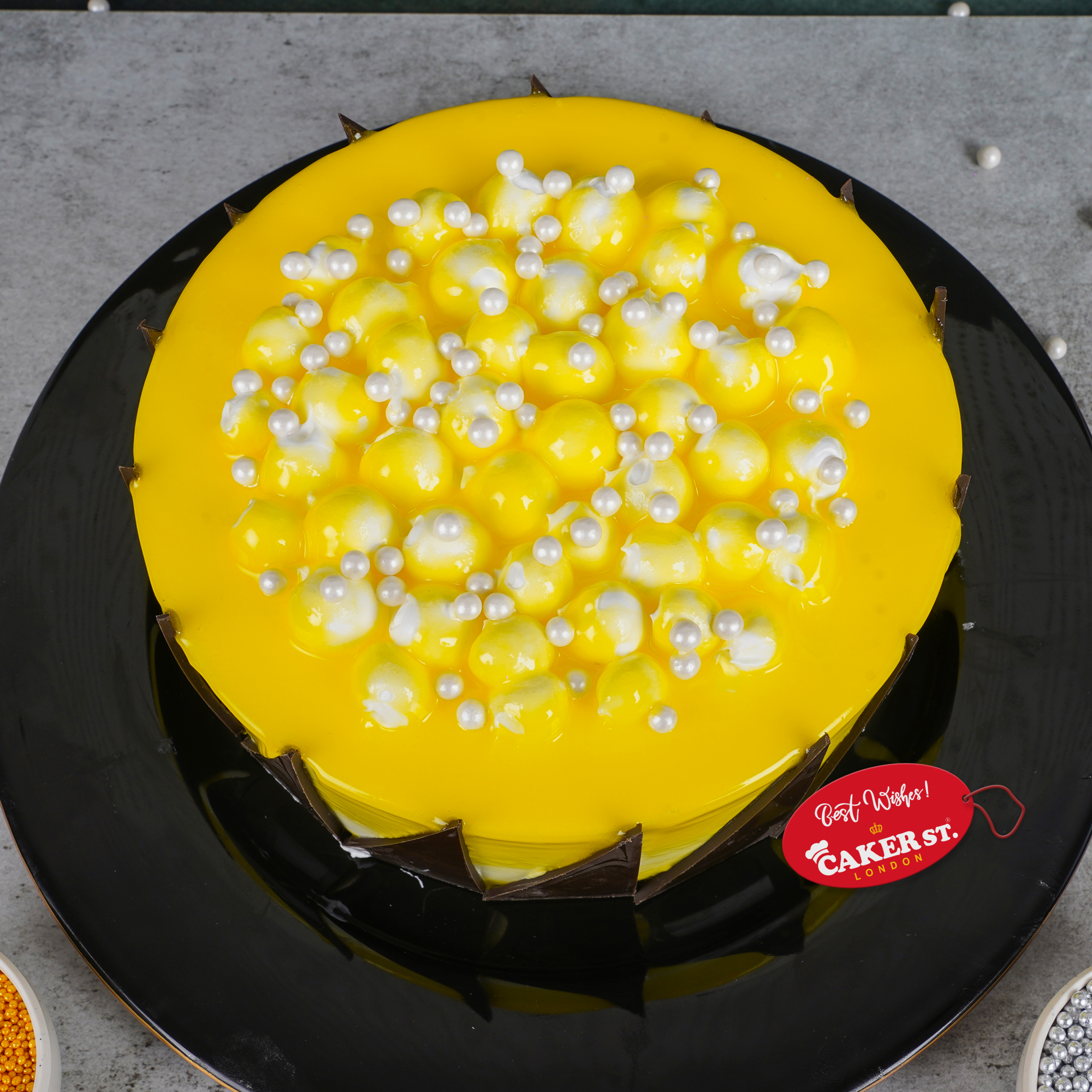 Elegant Yellow Birthday Cake with Chocolate Shards & Pearls