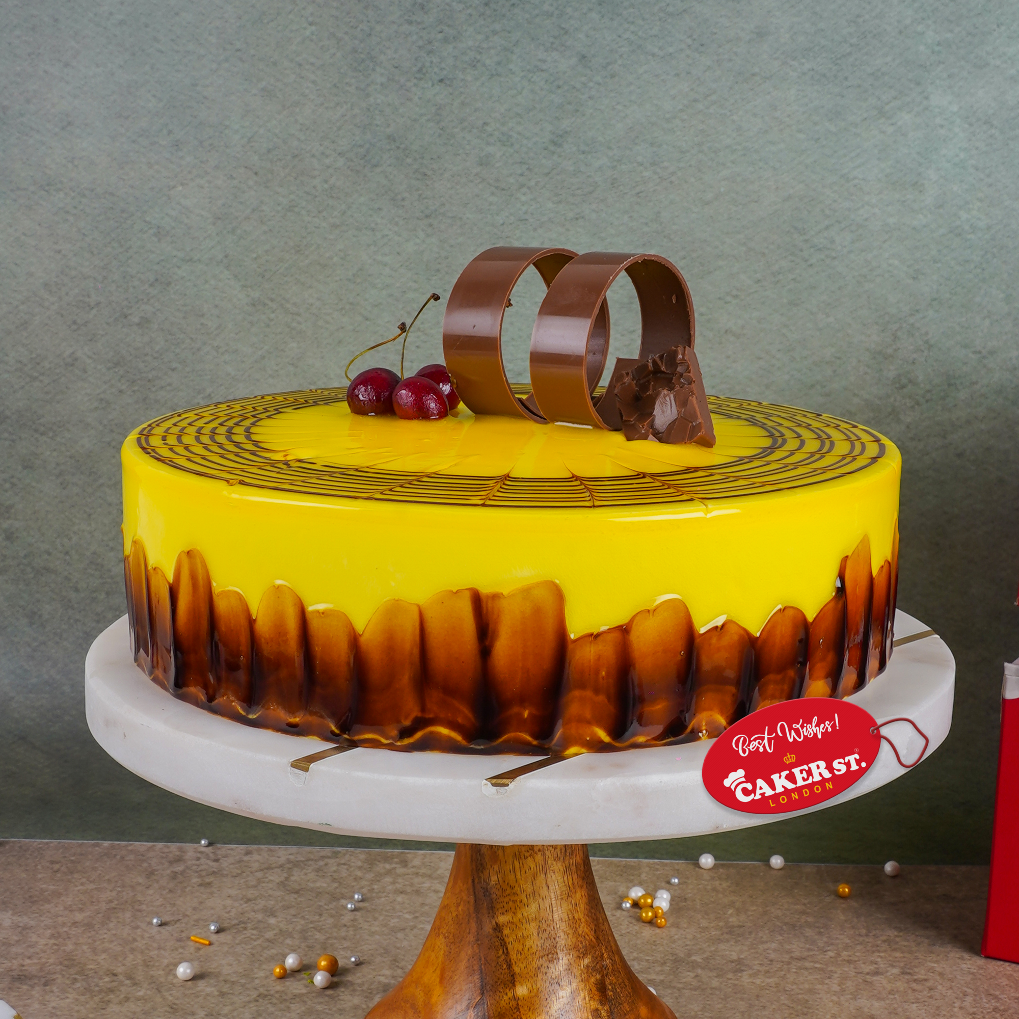 Elegant Yellow Glaze Birthday Cake with Chocolate Decor